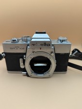 Minolta SRT 102 35mm Film Camera With Original Strap. Tested Working