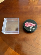 Jon Merrill #24 Autographed Detroit Red Wings Hockey Puck