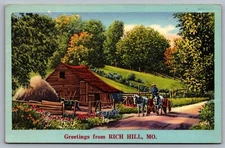 Greetings From Rich Hill, MO. Log Cabin. Postcard