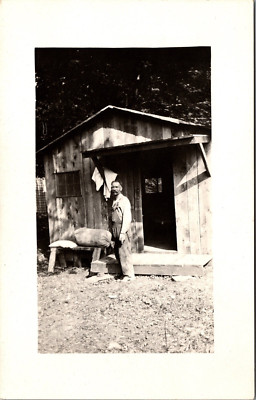 Postcard Real Photo RPPC Man Farmer Standing Outside Wooden Shed