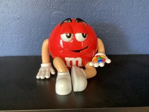 M&M Dispenser Red Sitting Legs Crossed