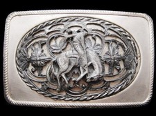 IH15120 VINTAGE 1970s  COWBOY  BUCKING BRONCO  SILVERTONE BUCKLE