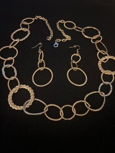 Mixed metal graduated rings, necklace gold texture, chain circles in earrings