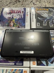 Nintendo New 3DS XL System Black Bundle (Majora&rsquo;s Mask, Pok&eacute;mon Diamond, plus)