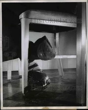 1956 Press Photo Man plants one foot on floor & shows nervourness - ned82488