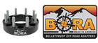 Black BORA rear spacers with silver hex bolts, shown with branded mountain-themed box reading “BORA Made in America.”