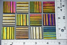 0100.46 - IRIDIZED ACCORDION TEXTURE ON BLACK 1" x 1" BULLSEYE GLASS 90 COE