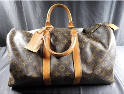 does dillards sell real louis vuitton