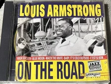 LOUIS ARMSTRONG: On The Road; CD Is LN, The Insert Is Crumpled, Free Shp