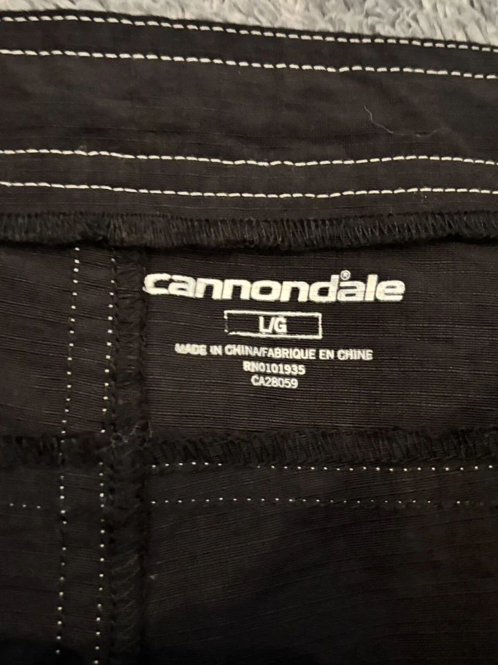 Calça de ciclismo Cannondale feminina grande preta capri náilon ponto de contraste ativo - Imagem 2 de 4