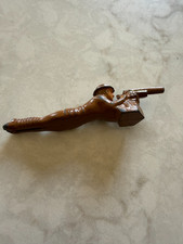 Die-cast army man prone on ground with gun, vintage