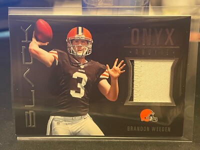 2012 Panini Black Onyx Rookie Materials Prime #6 Brandon Weeden 21/49