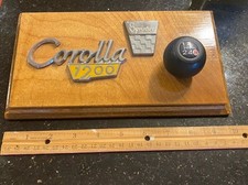 RARE PLAQUE TOYOTA COROLLA 1200 SPRINTER FIRST GENERATION EMBLEMS & SHIFTER KNOB