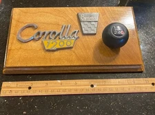 RARE PLAQUE TOYOTA COROLLA 1200 SPRINTER FIRST GENERATION EMBLEMS & SHIFTER KNOB