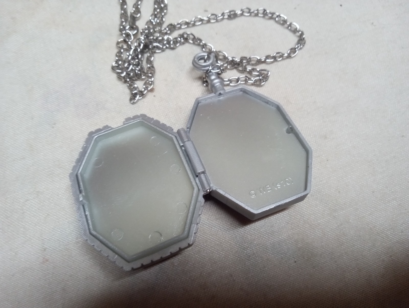 Harry Potter collectible lot, wizarding world trunk orb, pendan, medallion, figu