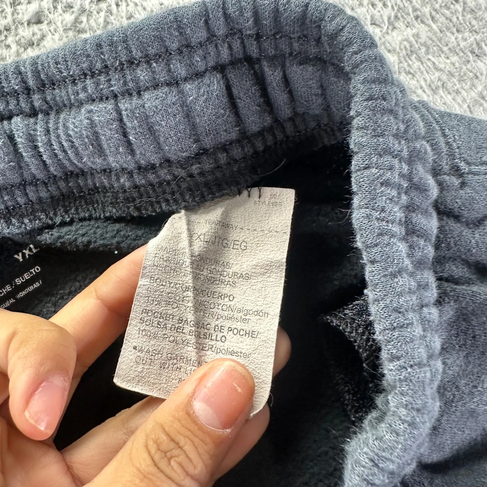 Pantalones de chándal Under Armour juveniles XL negros mezcla de algodón elásticos bolsillos Foto 4 de 4