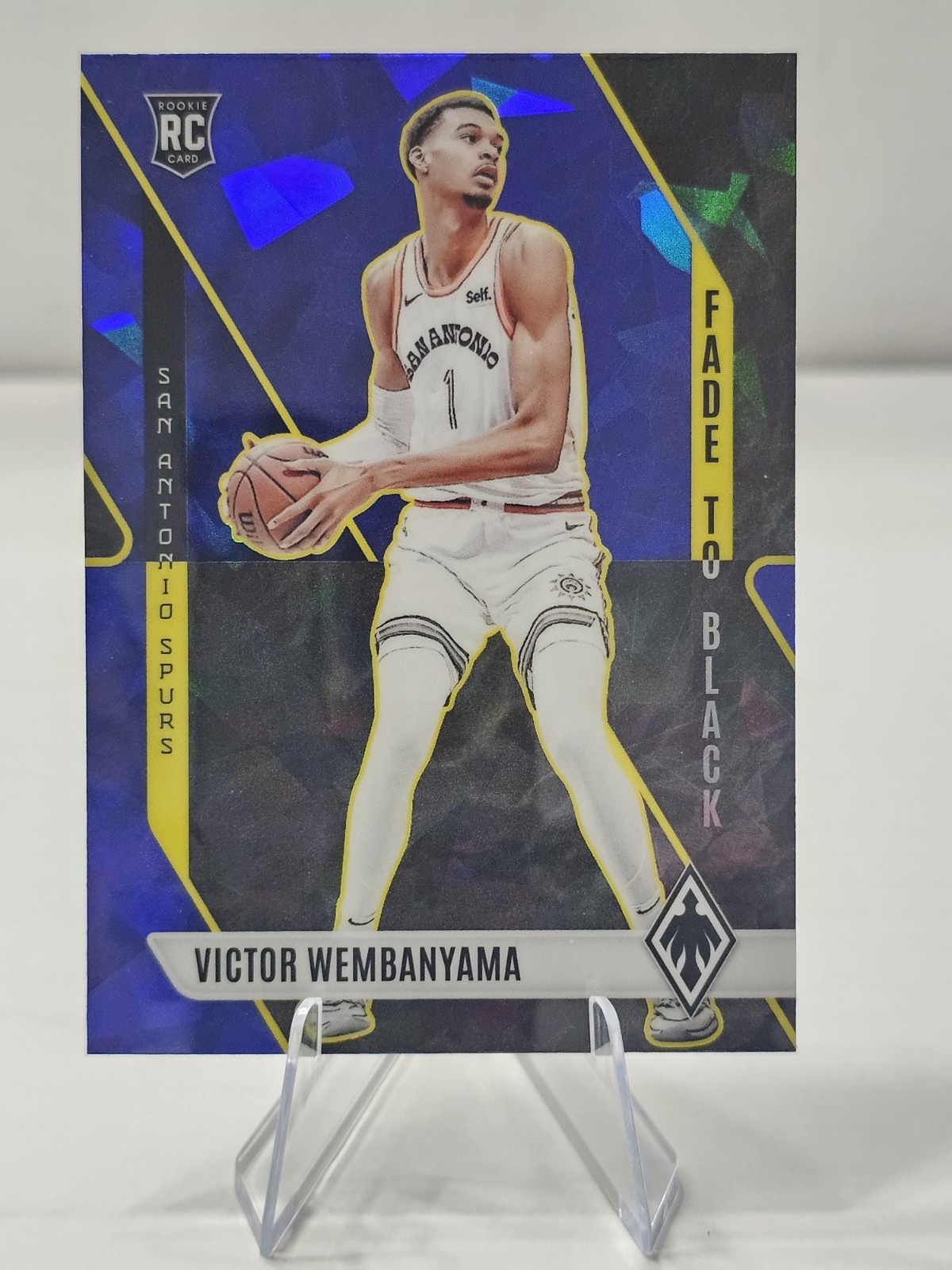 Victor Wembanyama RC Blue Ice Fade To Black 2023-24 Panini Phoenix Rookie Card