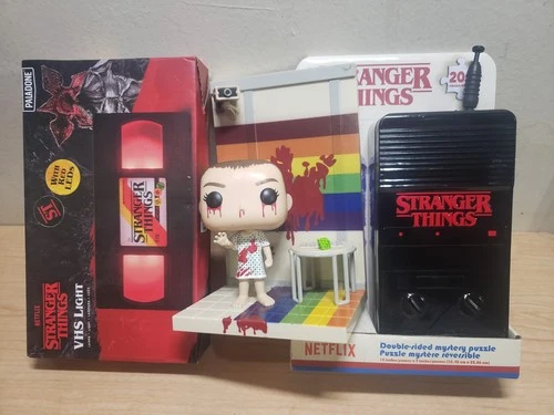 Funko Pop Stranger Things: Eleven 1251(damage & no box), VHS cassette and puzzle