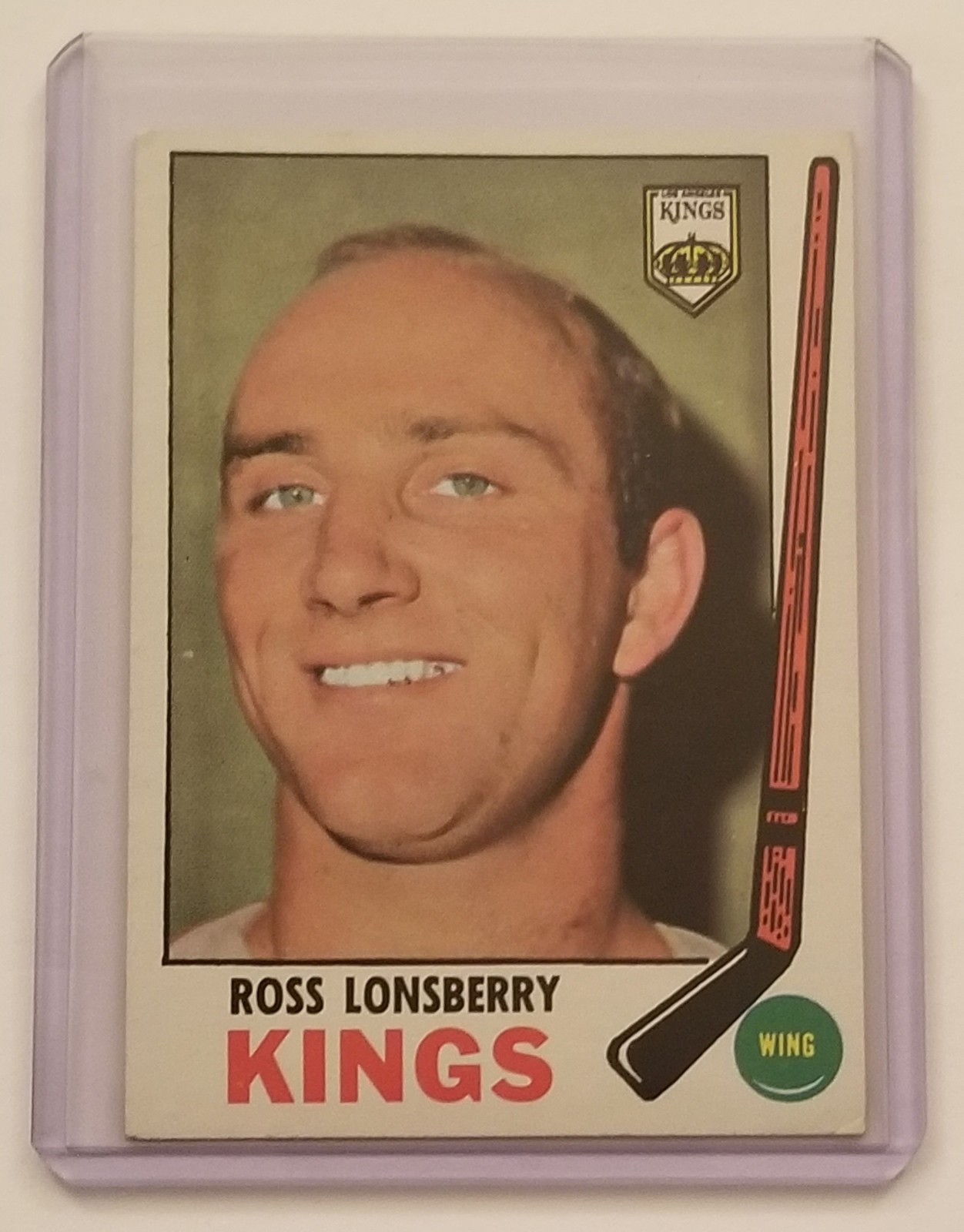 Ross Lonsberry #104 Hockey Cards 1969 Topps trading card — raw and PSA graded price guide