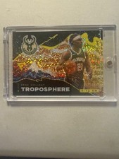 2020-21 Panini Flux Troposphere Prizm Jrue Holiday Milwaukee Bucks #12