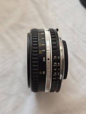 Mint- Nikon Nikkor 50mm f1.8 Series E Manual AIs AI-S (SN:297xxxx