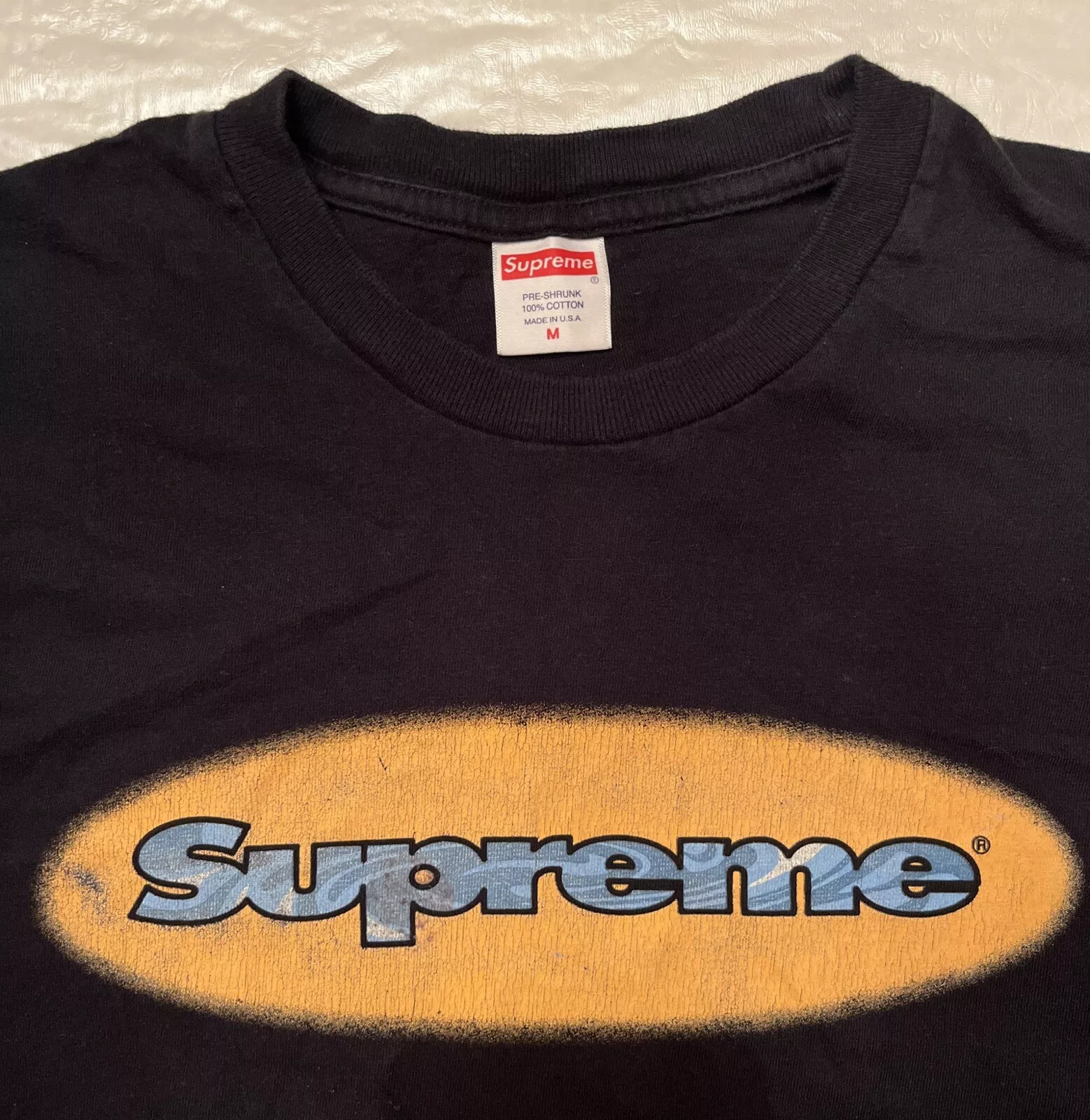 chemise vintage SUPREME MADE IN USA manches moyennes longues noir orange ovale Y2K