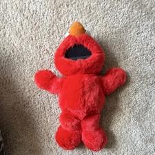 TYCO Sesame Street Elmo Red Plush 1995 works decent. Gets stuck SOMETIMES. Orig