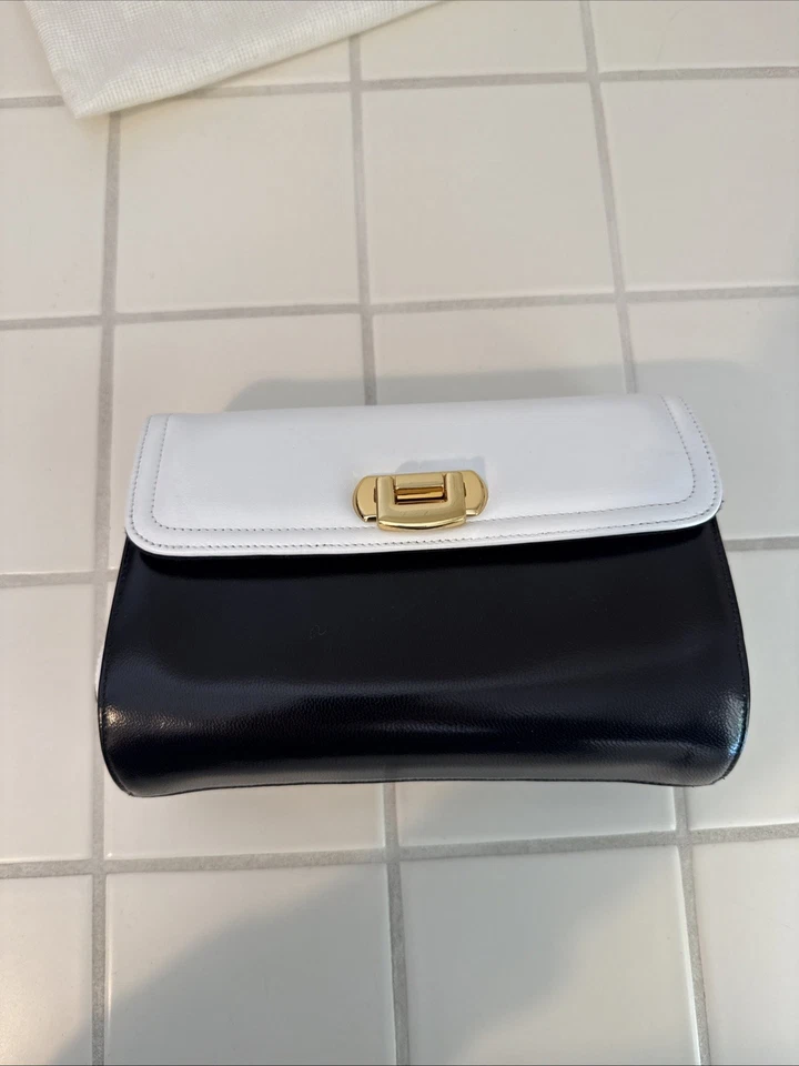 Cartera sin asas vintage Neiman Marcus blanca y negra bloque de color cuero dorado Foto 2 de 4