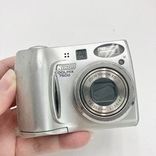 Nikon Coolpix 7600 7.1MP Digital Camera Silver   Powers On, Broken Battery Door