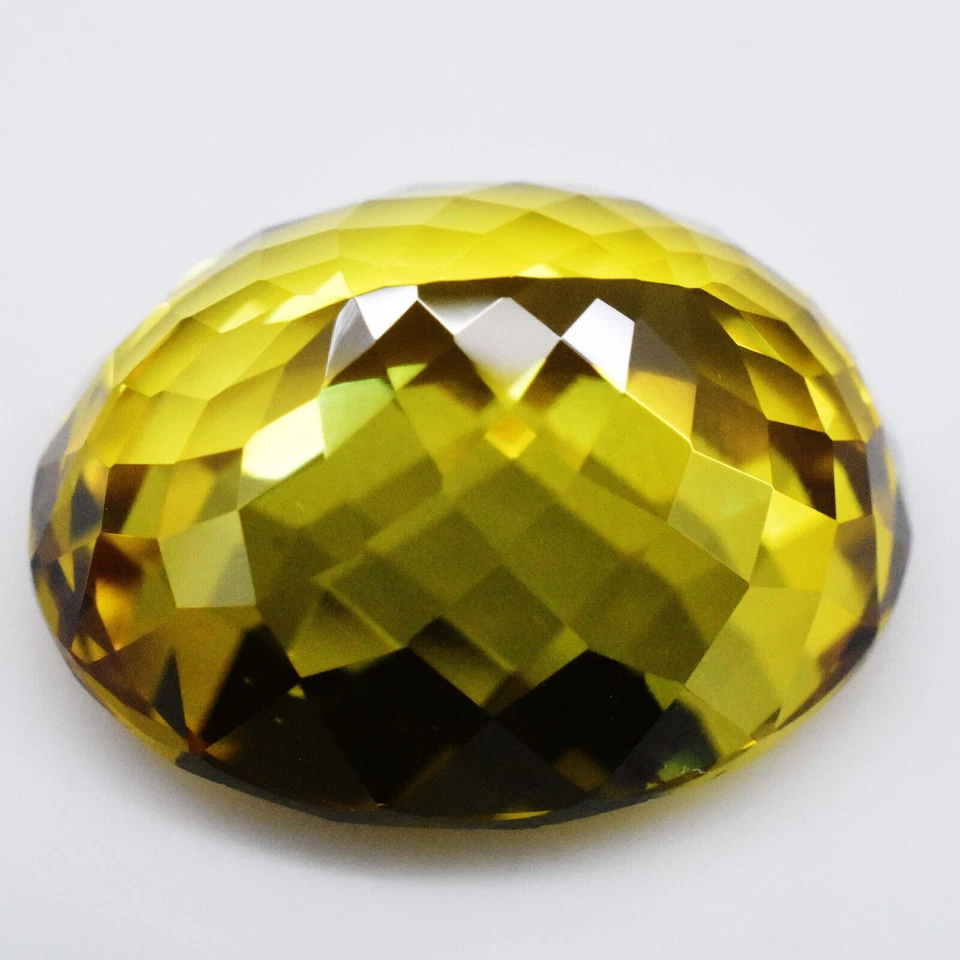 Impresionante 34,90 quilates VS ovalado bicolor granate grosular piedra preciosa de alta calidad Foto 4 de 4