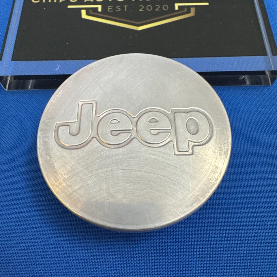 Tapa central Jeep Wrangler Grand Cherokee Compass Commander Liberty 52059522AA OEM Foto 2 de 4