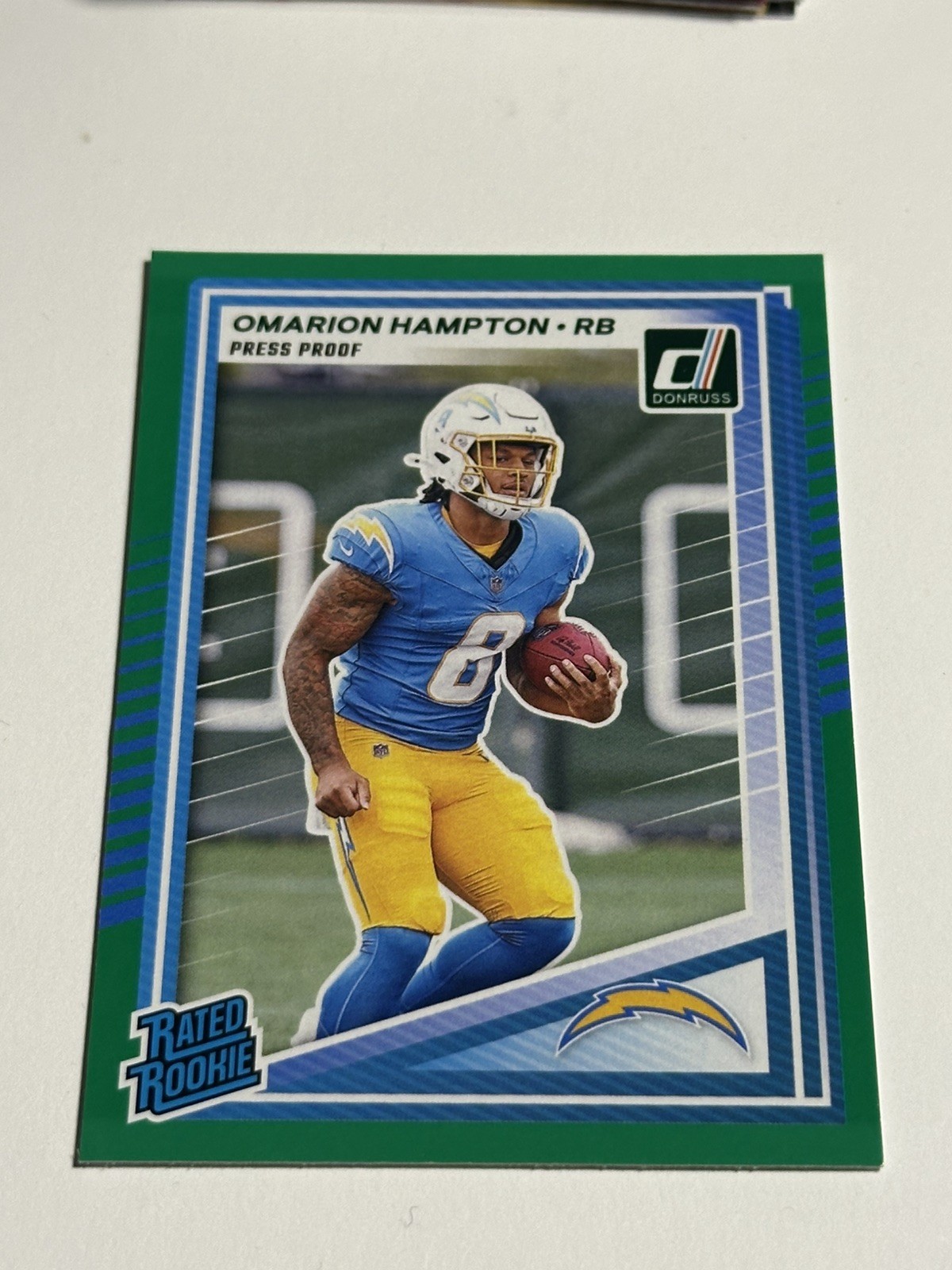 2025 Panini Donruss Omarion Hampton Press Proof Green Rated Rookie #303 Chargers