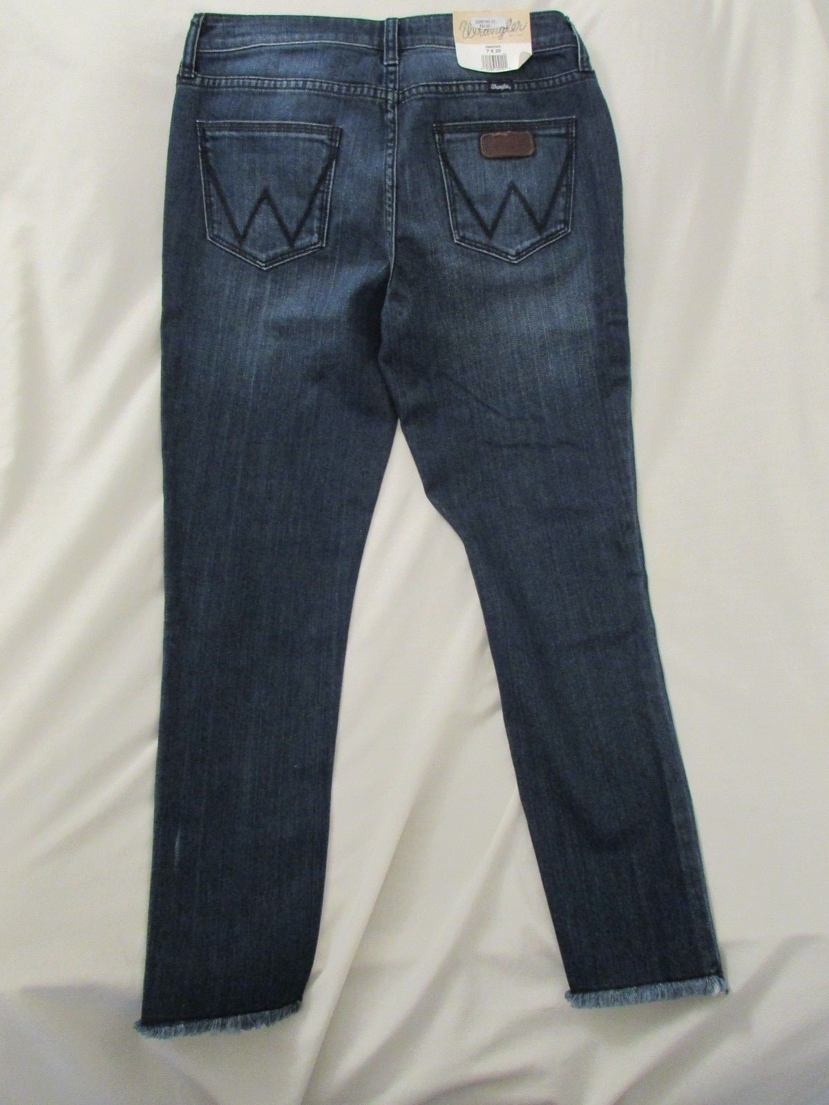Ladies "Wrangler" Size 9x28, Blue MidRise Distressed Embroidered Raw Hem Jeans image 2