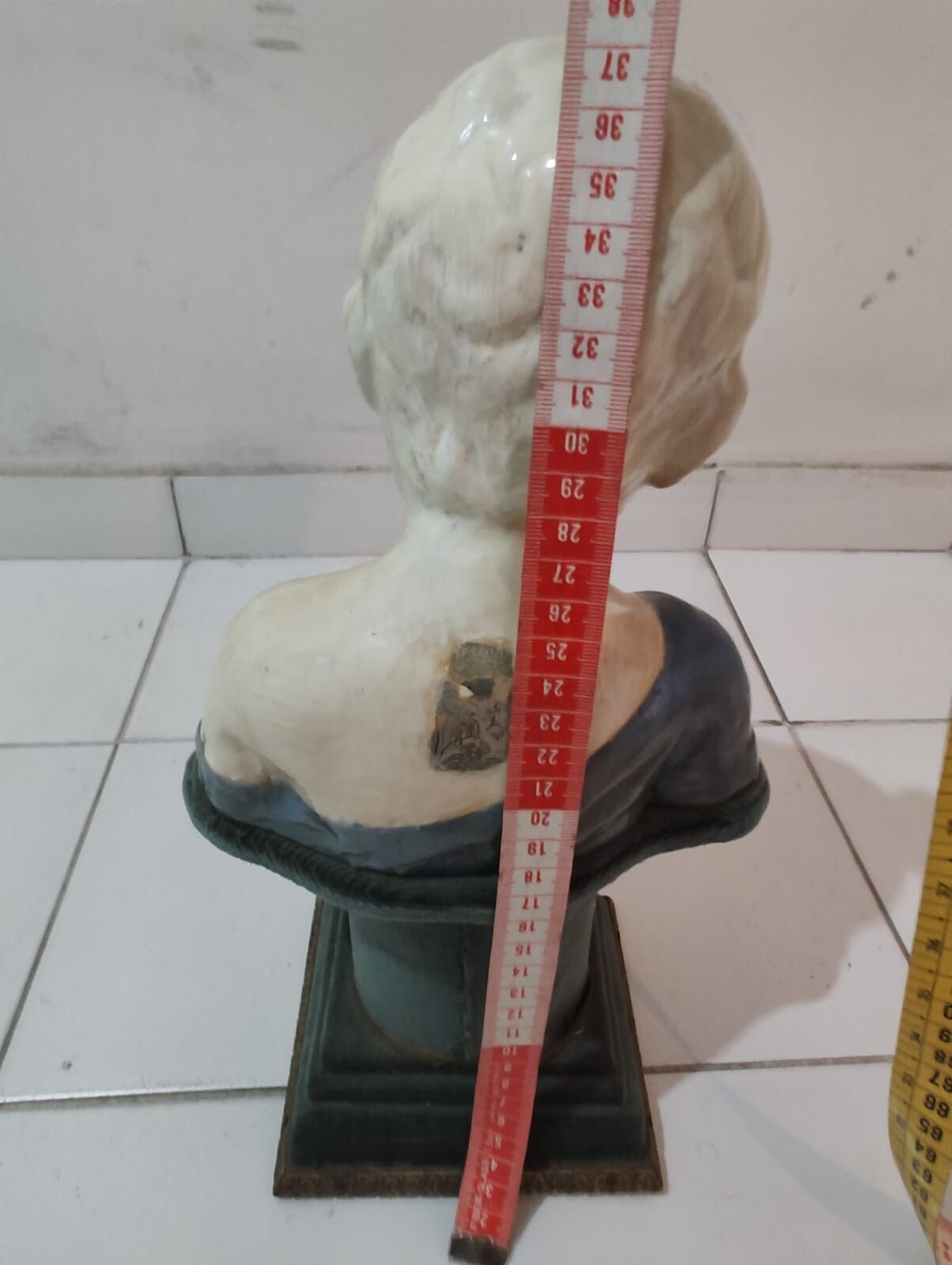 Ancient Roman bust of a pensive boy with lectern, illegible mark. Beautiful piec