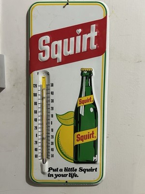 Vintage 1977 Squirt Thermometer sign