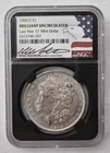 1904-O Morgan Silver Dollar NGC Brilliant Uncirculated. Hand Signed
