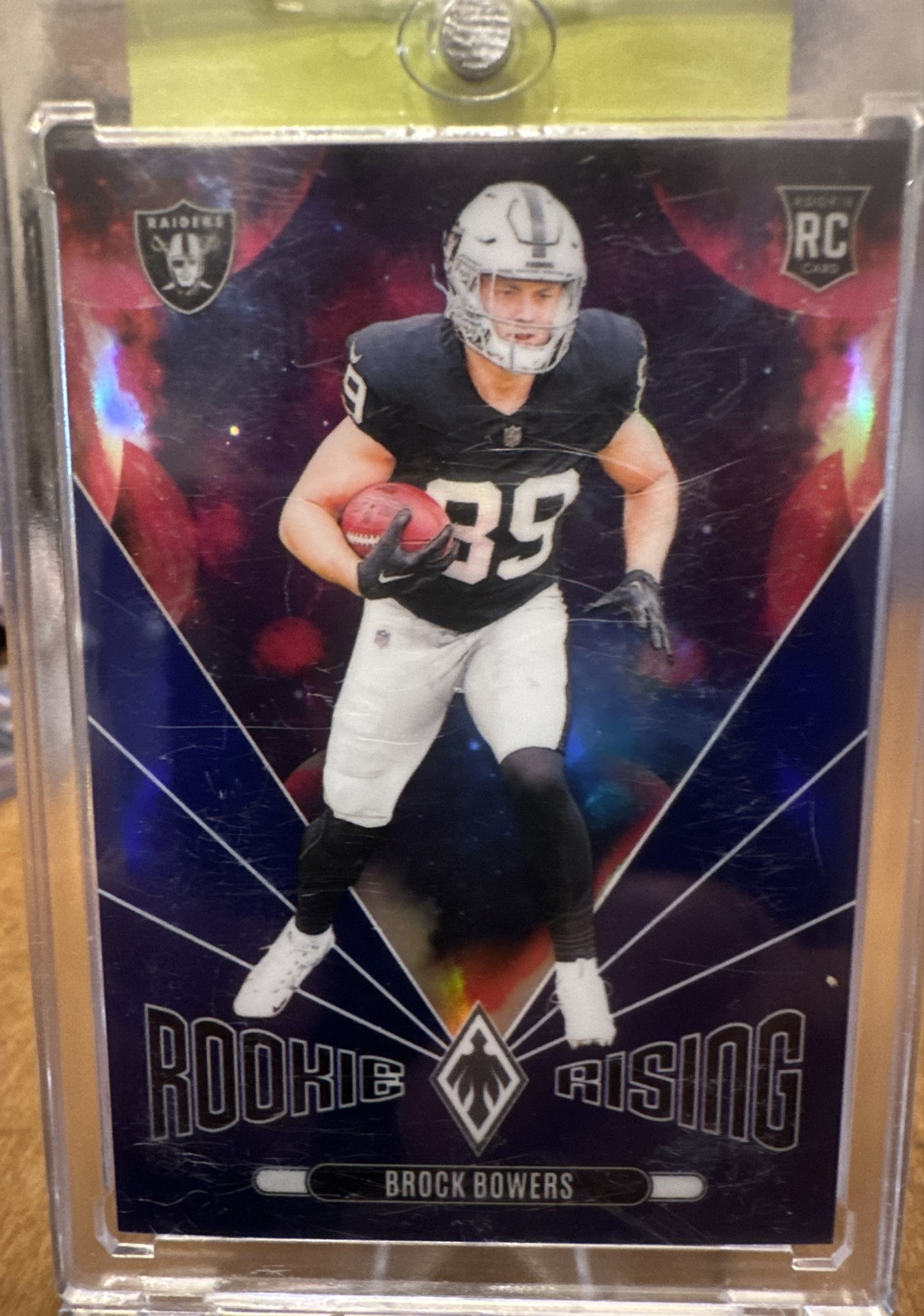 2024 Panini Phoenix - Rookie Rising Brock Bowers #RR-BBS Blue /50 (RC)