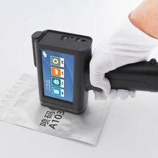Handheld inkjet printer prints text, batch number, barcode, production date LOGO