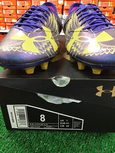 purple and gold soccer cleats