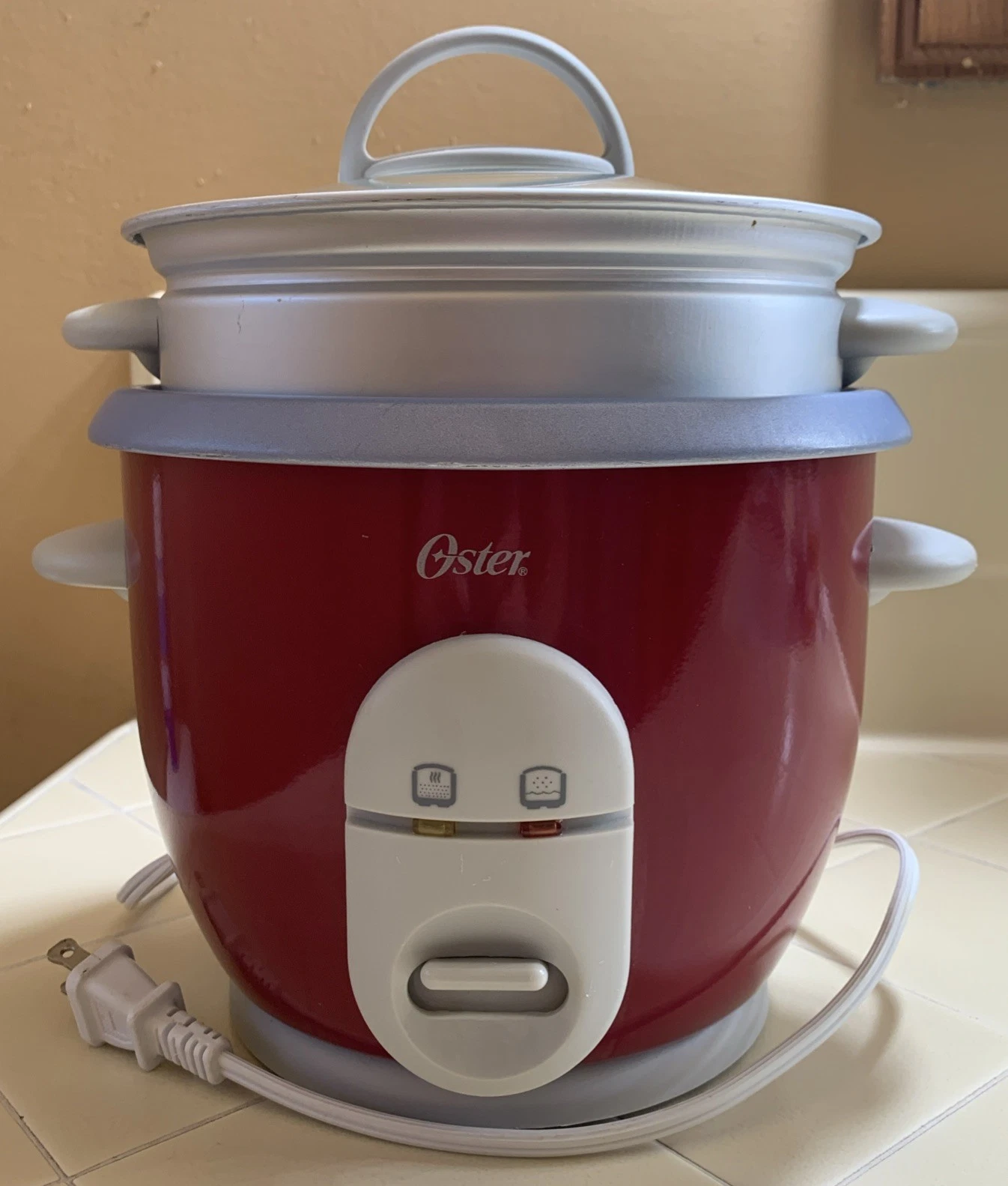 Oster 6-Cup Rice Cooker with Steamer, Red (004722-000-000)