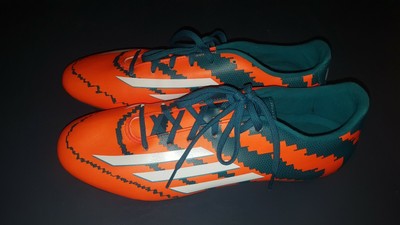 messi cleats orange