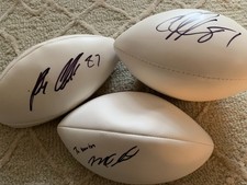 Calvin Johnson, Rob Gronkowski, Mike Evans signed auto mini-footballs. COAs