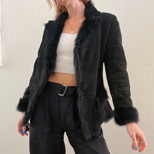 Gucci cappotto pelle shearling nero donna designer giacca invernale scamosciata