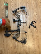 Bear Legit bow with drop awayg rest, arrows, and release