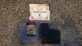 Nintendo NES Teenage Mutant Ninja Turtles (con offerta pizza intatta)