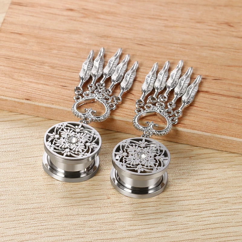 Kit de estiramiento expansor de oreja calibre túnel caída pluma corazón corazón acero quirúrgico 2 piezas Foto 3 de 4