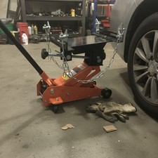 Compact 12 Ton Transmission Jack Adapter - Heavy-duty Rust-resistant Finish Compact 12 Ton Transmission Jack Adapter - Heavy-duty Rust-resistant Finish