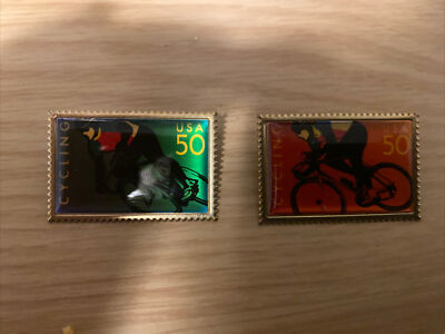 Set Of 2 50 cent postage stanp metal pins cycling