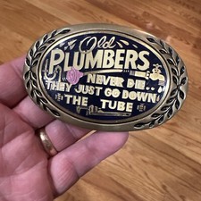 Old Plumbers Never Die, They Just Go Down the Tube. Brass belt buckle Made USA