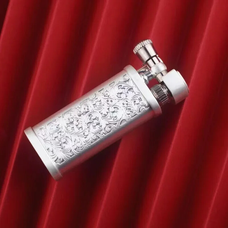 A WWI-era trench lighter aesthetic in a refillable metal body — old-school cool that actually works and fits in a shirt pocket.